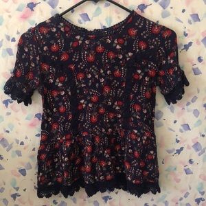 Navy and red floral lace shirt.